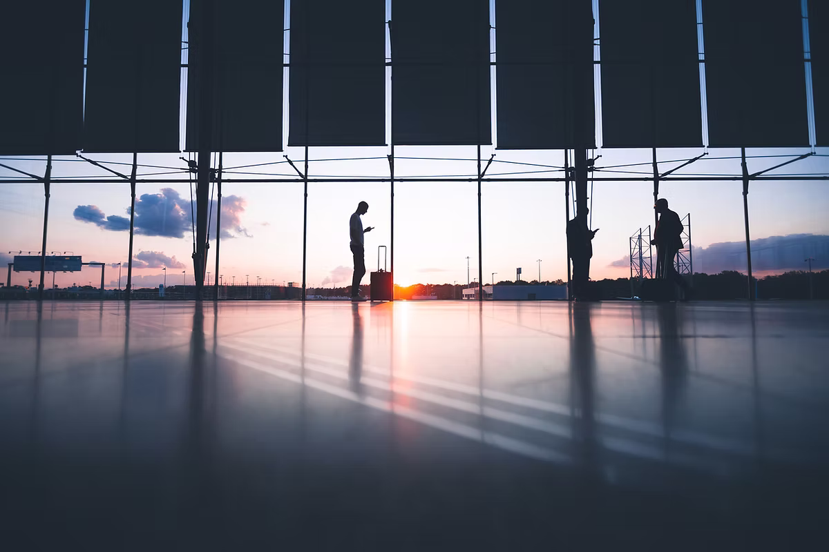 corporate travel insurance covered employee at airport